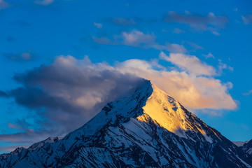 Naklejka na ściany i meble Snowcapped top of mountain in Himalayas