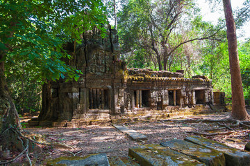 The ancient ruins of a historic Khmer temple in the temple compl