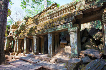 The ancient ruins of a historic Khmer temple in the temple compl