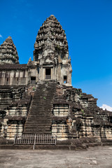 The ancient ruins of a historic Khmer temple in the temple compl