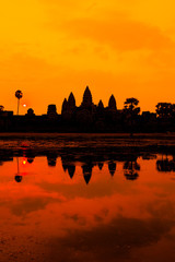 Naklejka premium The ancient ruins of a historic Khmer temple in the temple compl