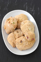 cookies with dry fruits on white dish