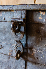 Closeup on the locks of an old metal chest