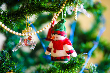 Christmas and New Year's toys on the Christmas tree