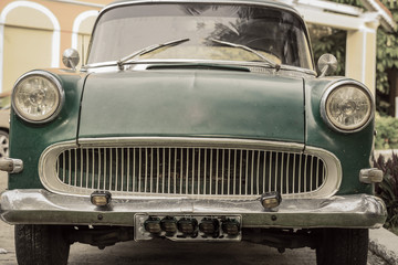 Obraz na płótnie Canvas Front view of an old vintage retro classic car