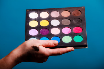 Palette of professional colorful eye shadows. 