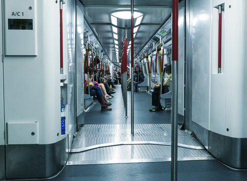 HONG KONG - APRIL 14, 2014: People in city subway train. More th