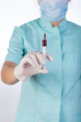 Syringe with blood sample