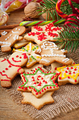 Christmas gingerbread cookies on a wooden background