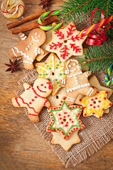 Christmas gingerbread cookies on a wooden background