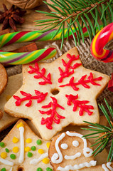 Christmas gingerbread cookies on a wooden background