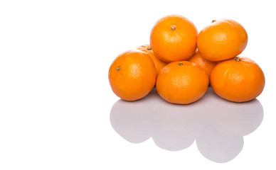 A group of Mandarin orange fruit over white background
