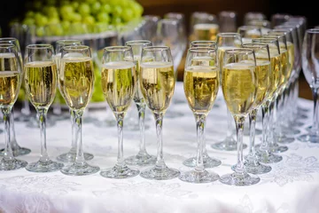 Foto op Plexiglas anti-reflex Glasses of champagne waiting for guests © Canvas Alchemy