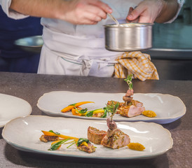 chef in restaurant kitchen cooking