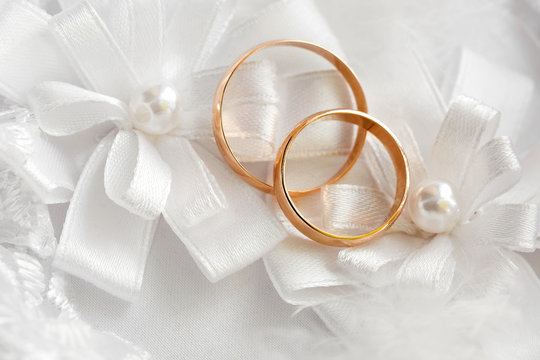Wedding gold ring, decorations for a wedding celebration.