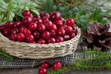 cranberries in a basket on a table