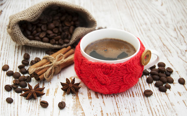 Cup with knitted thing