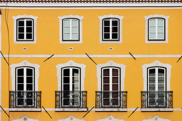 House with Yellow Facade