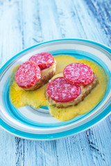 bread with salami and cheese