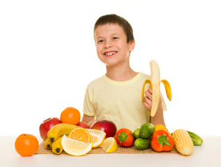 boy with fruits and vegetables