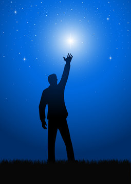 Silhouette of a male figure reaching out for the star