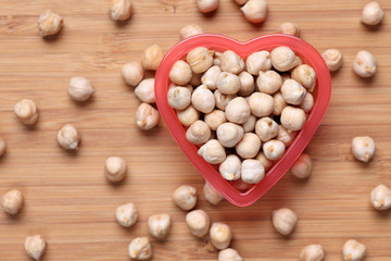 Chickpeas in a heart bowl