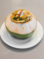 steamed fish and seafood in fresh coconut