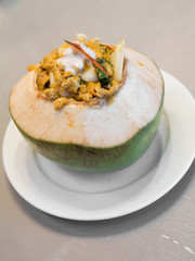 steamed fish and seafood in fresh coconut