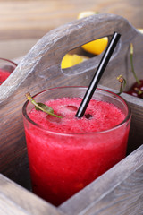 Fresh cold cherry cocktail with mint and lemon