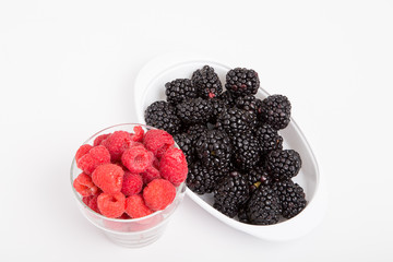 Raspberries and Blackberries on White