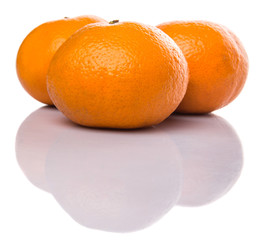 A group of Mandarin orange fruit over white background