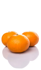 A group of Mandarin orange fruit over white background