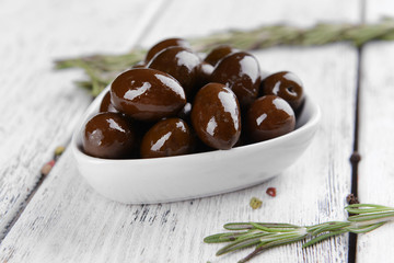 Marinated olives on table close-up