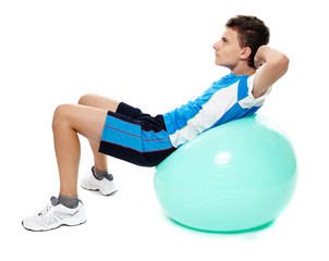 Teenager doing abs crunches