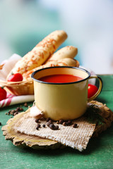 Homemade tomato juice in glass, spices and fresh tomatoes