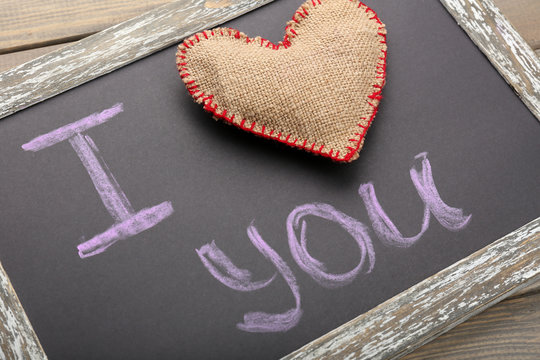 I love you written on chalkboard, close-up