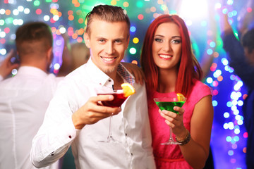 Young people dancing at party