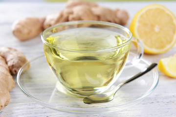 Ginger tea with lemon on table close-up