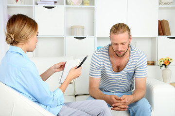 Young man on reception at psychologist