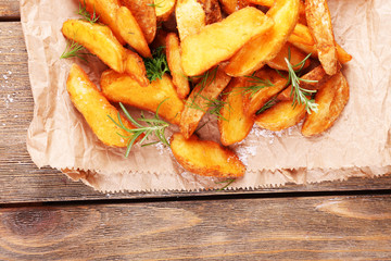 Homemade fried potato with spices and herbs