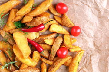 Homemade fried potato with spices and herbs