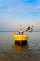 Obraz premium Lonely boat at sea in Sopot, Poland.