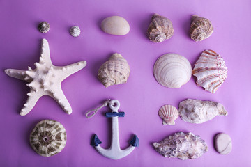 Sea souvenirs on purple background