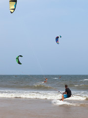 Unidentified people during demonstration of kitesurfing