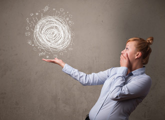 Chaos concept in the hand of a businesswoman