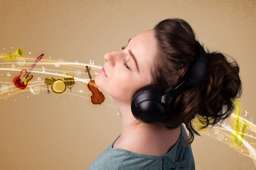 Young woman with headphones listening to music