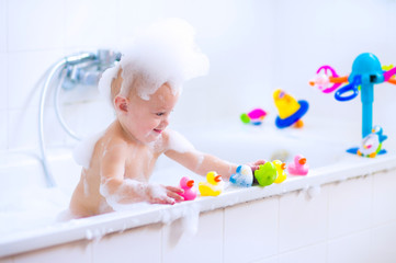 Funny baby in bath