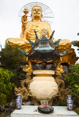 Giant sitting golden Buddha.