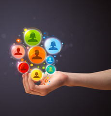 Social network icons in the hand of a woman