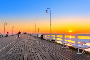 Sunrise at wooden pier (molo) in Sopot, Poland